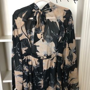 Floral romper with open back